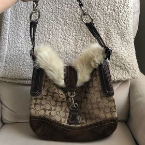 Brown, faux fur lined Coah bag